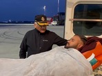 Union minister VK Singh comforts Delhi resident Harjot Singh, who was shot at four times in Ukraine, as he is being taken inside an IAF aircraft to be flown back to India from Poland. (Screengrab/VK Singh Twitter) Union minister VK Singh comforts Delhi resident Harjot Singh, who was shot at four times in Ukraine, as he is being taken inside an IAF aircraft to be flown back to India from Poland. (Screengrab/VK Singh Twitter)