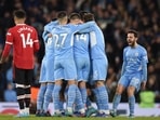 Manchester City celebrate a goal against Manchester United Manchester City celebrate a goal against Manchester United