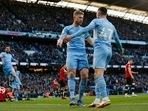 Manchester City's Kevin De Bruyne celebrates scoring their second goal with Phil Foden
