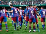 Barcelona's Memphis Depay celebrates scoring their second goal with teammates