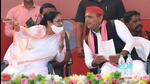 West Bengal chief minister Mamata Banerjee and Samajwadi Party national president Akhilesh Yadav at a public meeting for the UP polls in Varanasi on March 3. (HT FILE PHOTO)