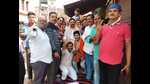 Voters posing after exercising their franchise in Varanasi on Monday. (HT PHOTO)