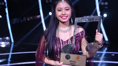 Neelanjana Ray bags the winner's trophy at Sa Re Ga Ma Pa.