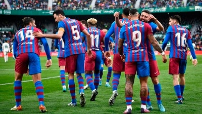 Barcelona's Memphis Depay celebrates scoring their second goal with teammates (REUTERS)