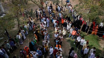 UP election: People stand in a queue to cast their vote at a polling station during the last phase of Uttar Pradesh assembly election in Varanasi. (REUTERS) UP election: People stand in a queue to cast their vote at a polling station during the last phase of Uttar Pradesh assembly election in Varanasi. (REUTERS)
