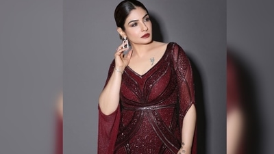 The gown featured a plunging neckline, half slit floor-sweeping sleeves and sequins work all over the attire. (Instagram/@officialraveenatandon)