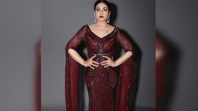 Raveena Tandon teamed her evening party outfit with diamond earrings and bracelette. (Instagram/@officialraveenatandon)