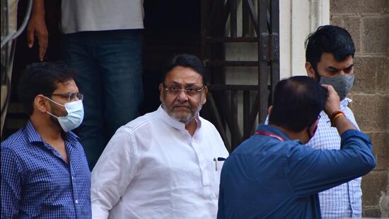 NCP leader and Maharashtra Minister Nawab Malik being taken to the Sessions Court from ED Office, in Mumbai on Monday. (Bhushan Koyande/ HT Photo)