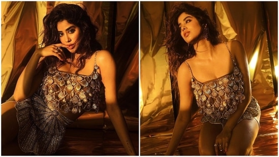 Janhvi Kapoor loves giving a spin to her outfit. In her recent Instagram pictures, the Dhadak actor can be seen giving mermaid vibes as she struck poses in a metallic dazzling outfit.(Instagram/@janhvikapoor)