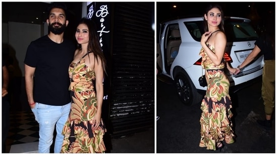 Mouni Roy in a tube top and skirt set with Suraj Nambiar.(HT Photo/Varinder Chawla)