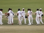 Indian team players celebrate after winning the first test match by an innings and 222 runs against Sri Lanka, at PCA Stadium, in Mohali on Sunday(ANI)