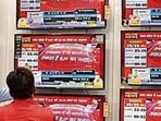 File photo of people watching exit poll predictions by various news channels in an electronics shop in New Delhi.(HT) File photo of people watching exit poll predictions by various news channels in an electronics shop in New Delhi.(HT)