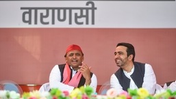 Samajwadi Party president Akhilesh Yadav and RLD chief Jayant Chaudhary during a public meeting for the just concluded UP assembly polls, in Varanasi, Thursday, March. 03, 2022. (PTI Photo/Arun Sharma)