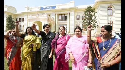 Women legislators demonstrates outside the Bihar Assembly on the occasion of Women’s Day on Tuesday. (Santosh Kumar/Ht Photo)