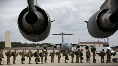 US troops deploy for Europe from Pope Army Airfield at Fort Bragg, North Carolina. - The United States is sending 500 more troops to Europe to boost NATO security, an official said. (AFP) US troops deploy for Europe from Pope Army Airfield at Fort Bragg, North Carolina. - The United States is sending 500 more troops to Europe to boost NATO security, an official said. (AFP)