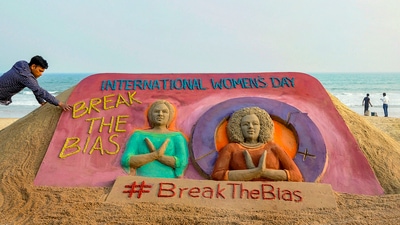 Sand artist Manas Sahoo makes a sculpture on the occasion of 'International Women's Day', in Puri. (PTI) Sand artist Manas Sahoo makes a sculpture on the occasion of 'International Women's Day', in Puri. (PTI)