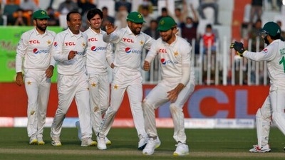 Nauman Ali, second left, celebrates with teammates after taking the wicket of Australia's Steve Smith during the 4th day of the first test match (AP) Nauman Ali, second left, celebrates with teammates after taking the wicket of Australia's Steve Smith during the 4th day of the first test match (AP)