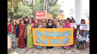 Women takes out a march in Nagepur village, a Saansad Adarsh Gram in Varanasi district. (HT)