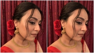 Swara's ivory white saree came intricately detailed in white resham threads and a red border, further decorated in ivory-white prints. Swara paired it with a red blouse with dramatic sleeves. (Instagram/@reallyswara)