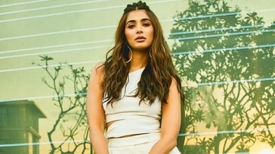 Pooja Hegde turns boss babe in crop top and flared pants while promoting Radhe Shyam: Check out pics Pooja Hegde turns boss babe in crop top and flared pants while promoting Radhe Shyam: Check out pics