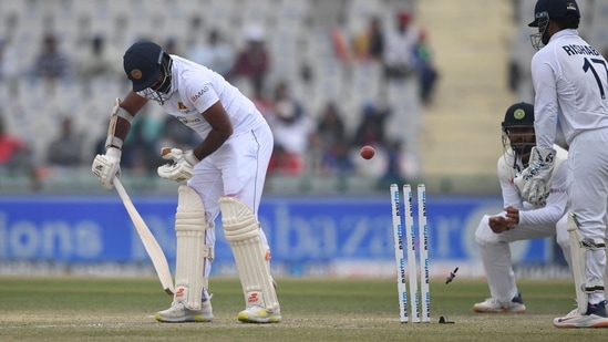 Sri Lanka's Lahiru Kumara is cleaned bowled by India's Ravindra Jadeja (not pictured) during the third day of the first Test cricket match between India and Sri Lanka at the Punjab Cricket Association Stadium in Mohali(AFP)