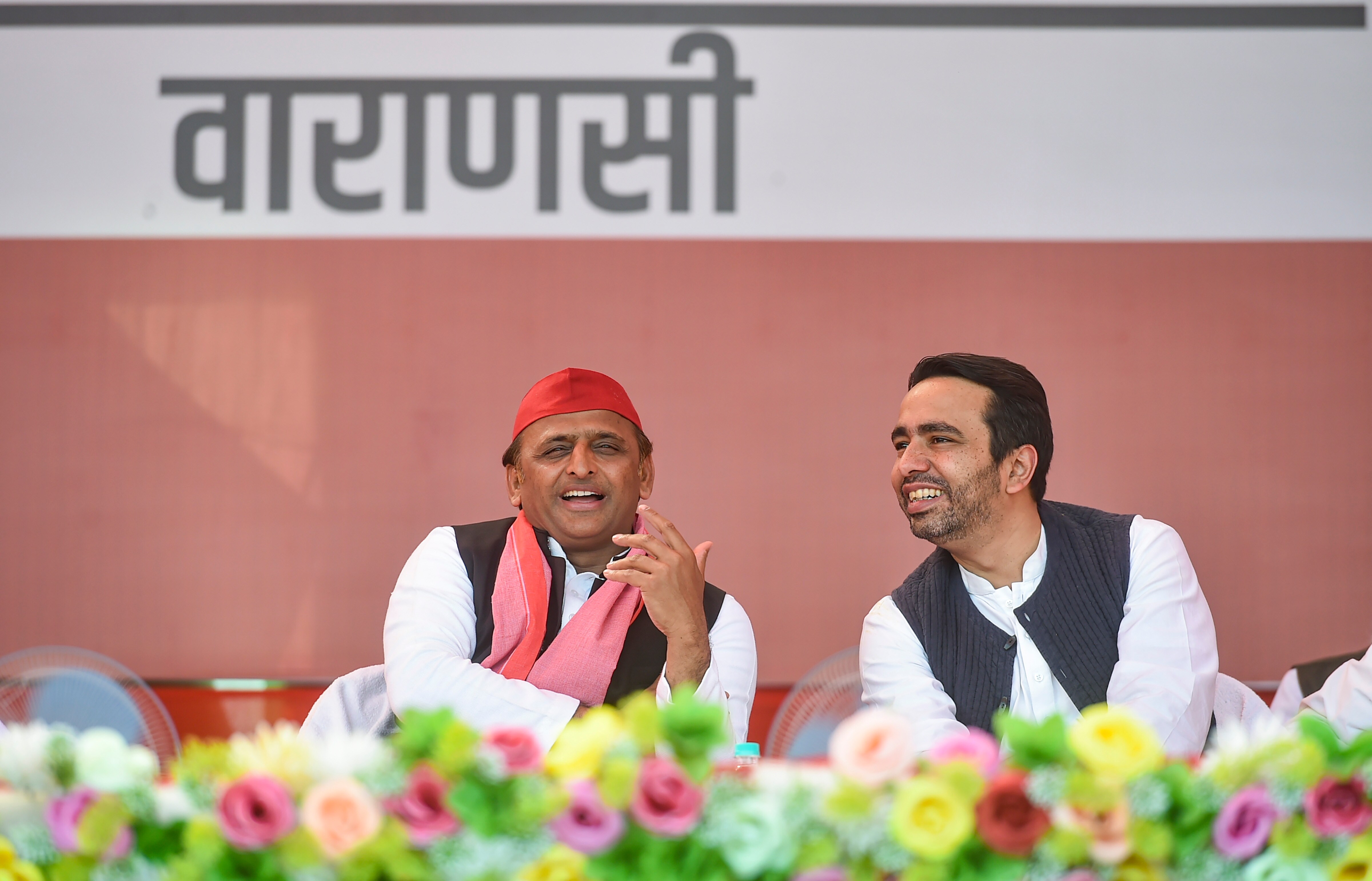 Samajwadi Party president Akhilesh Yadav and RLD chief Jayant Chaudhary during a public meeting for the just concluded UP assembly polls, in Varanasi, Thursday, March. 03, 2022. (PTI Photo/Arun Sharma)