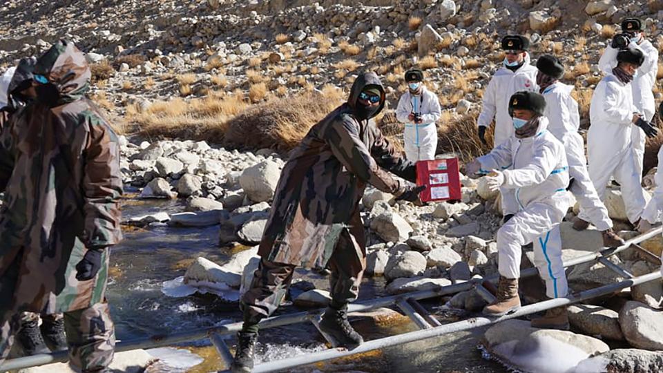 Indian and Chinese troops exchange greetings along the Line of Actual Control on New Year’s. (PTI Photo)