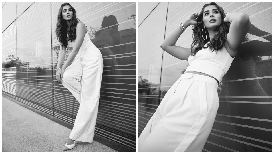 Pooja Hegde promotes Radhe Shyam in the all-white ensemble. Pooja Hegde promotes Radhe Shyam in the all-white ensemble. 