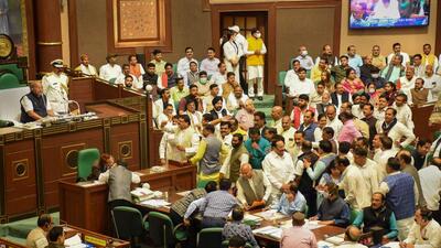 Congress lawmakers protested as the Budget was being presented. (PTI) Congress lawmakers protested as the Budget was being presented. (PTI)