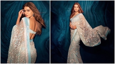 Kriti Sanon and her Bachchhan Paandey co-star Akshay Kumar have kickstarted the promotions of the film. Recently, the actor was spotted wearing a gorgeous pastel blue custom made saree by ace designer Manish Malhotra for a promotional event. (Instagram/@sukritigrover) Kriti Sanon and her Bachchhan Paandey co-star Akshay Kumar have kickstarted the promotions of the film. Recently, the actor was spotted wearing a gorgeous pastel blue custom made saree by ace designer Manish Malhotra for a promotional event. (Instagram/@sukritigrover)