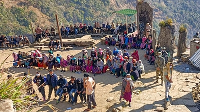 People wait outside a polling station to cast their votes, during the repolls of a few Manipur Assembly constituencies. (PTI) People wait outside a polling station to cast their votes, during the repolls of a few Manipur Assembly constituencies. (PTI)