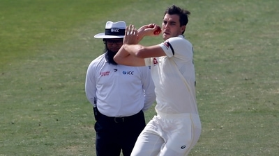 Australia's Pat Cummins, front, bowls during the 5th day of the first test match between Pakistan and Australia at the Pindi Stadium, in Rawalpindi. (AP) Australia's Pat Cummins, front, bowls during the 5th day of the first test match between Pakistan and Australia at the Pindi Stadium, in Rawalpindi. (AP)