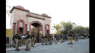 Security personnel stand guard outside the strong room at Ramabai Ambedkar Maidan before a day of counting of Uttar Pradesh Assembly Election, in Lucknow on Wednesday. (ANI)