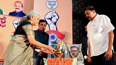 Union finance minister Nirmala Sitharaman lighting the lamp during an interaction with BJP workers, social media volunteers, corporate professionals and representatives from BJP Economic Cell during a programme, in Bengaluru on Tuesday. (ANI) Union finance minister Nirmala Sitharaman lighting the lamp during an interaction with BJP workers, social media volunteers, corporate professionals and representatives from BJP Economic Cell during a programme, in Bengaluru on Tuesday. (ANI)