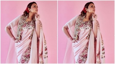 Huma added more drama to her look with shrug of sorts of the same colour around her shoulders. The pastel pink shrug also showcased floral patterns and zari details. (Instagram/@iamhumaq)