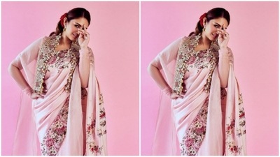 Styled by makeup artist Ajay Vishwasrao, Huma wore her tresses open with red roses tucked inside and decked up in minimal makeup to complement her attire. In nude eyeshadow, black eyeliner, black kohl, mascara-laden eyelashes, drawn eyebrows, contoured cheeks and a shade of nude lipstick, Huma looked ravishing. (Instagram/@iamhumaq)