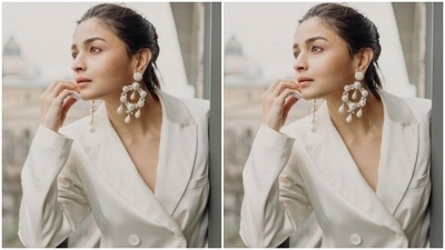 Alia wore her tresses into a clean bun as she looked away from the camera. (Instagram/@aliabhatt)