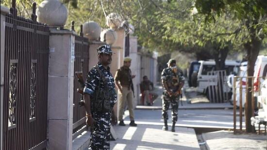 Security personnel outside a centre where counting of votes will take place for the UP polls in Lucknow. (Deepak Gupta/HT Photo)