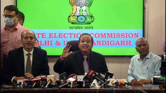 Delhi election commissioner SK Srivatava, secretary Sandeep Mishra and deputy secretary PK Goyal during the press conference at Delhi state commission, Nigam Bhawan, in New Delhi on Wednesday. (Raj K Raj/HT Photo) Delhi election commissioner SK Srivatava, secretary Sandeep Mishra and deputy secretary PK Goyal during the press conference at Delhi state commission, Nigam Bhawan, in New Delhi on Wednesday. (Raj K Raj/HT Photo)