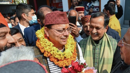Uttarakhand Chief Minister Pushkar Singh Dhami arrives at the BJP office after the election, (PTI Photo)