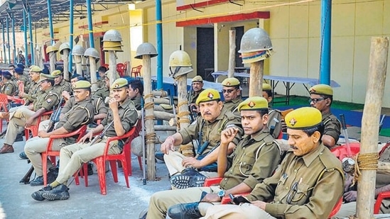 Additional police personnel on duty at Pahariya counting centre, amid controversy over the movement of EVMs, in Varanasi, on Wednesday. (PTI)