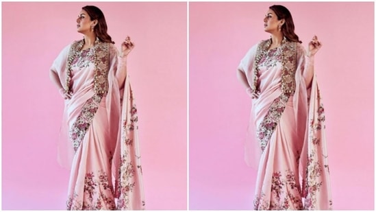 Huma's pastel pink saree came in intricate floral details all throughout and the borders came decorated in zari. Huma paired it with a neutral pastel blouse.(Instagram/@iamhumaq)