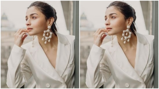 Alia wore her tresses into a clean bun as she looked away from the camera.(Instagram/@aliabhatt)