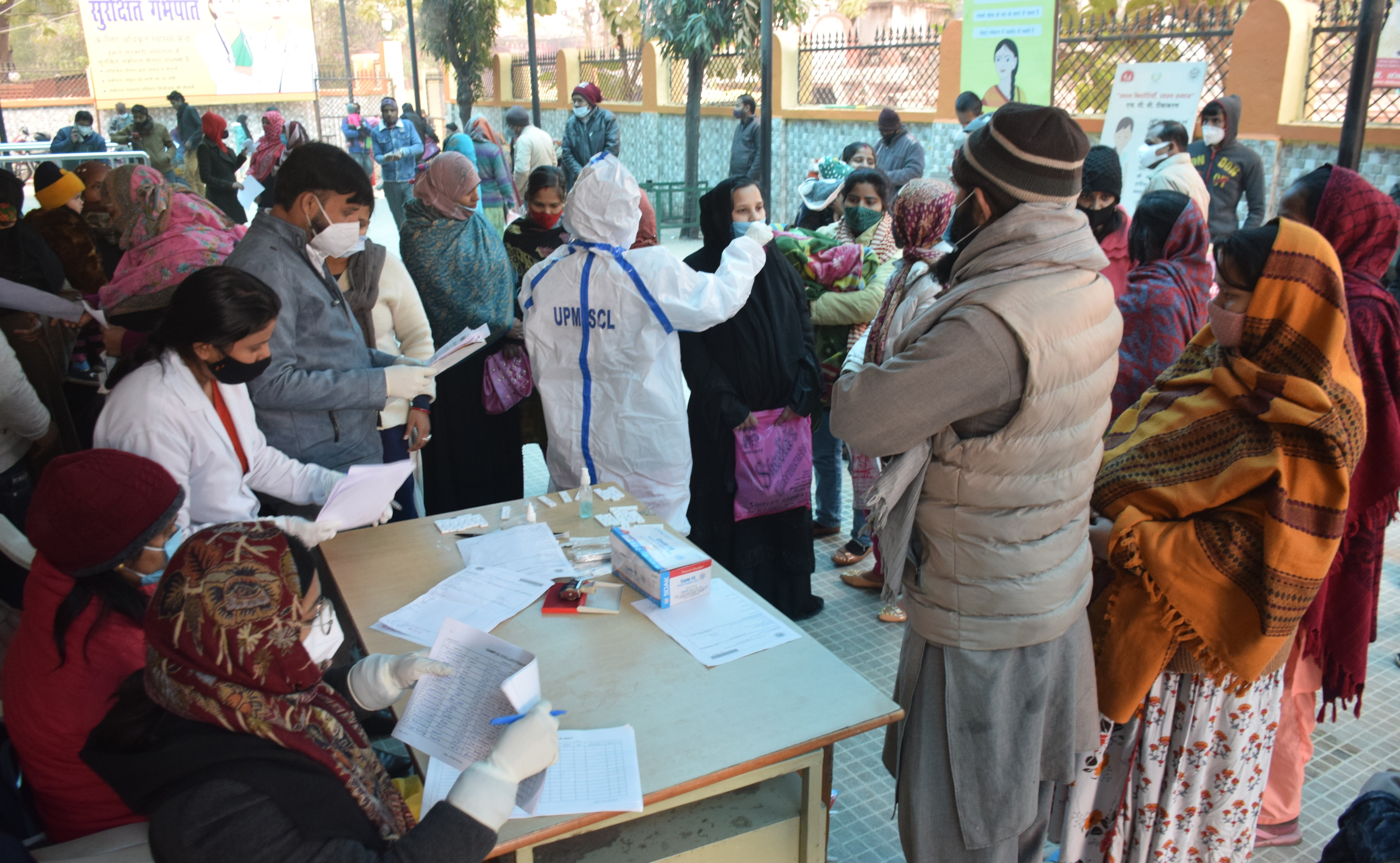 File photo of a health worker collecting sample from a woman. (HT_PRINT)