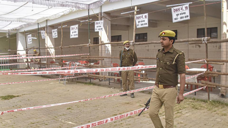 Security personnel at a counting centre in Uttar Pradesh’s Gorakhpur district on Wednesday. (PTI) Security personnel at a counting centre in Uttar Pradesh’s Gorakhpur district on Wednesday. (PTI)