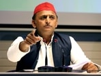 Samajwadi Party (SP) chief Akhilesh Yadav with Om Prakash Rajbhar (unseen) addresses a joint press conference over the EVM security issue at the party office, in Lucknow on Tuesday. (ANI Photo)(HT_PRINT)