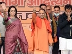 File photo of Uttar Pradesh Chief Minister Yogi Adityanath with Bharatiya Janata Party (BJP) Lok Sabha MP Hema Malini.(ANI)