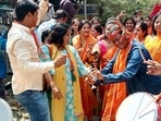 Bharatiya Janata Party (BJP) supporters celebrate party's lead in the Uttar Pradesh Assembly Election, at Gulab Bagh Sigra, in Varanasi on March 10, 2022. (ANI Photo) Bharatiya Janata Party (BJP) supporters celebrate party's lead in the Uttar Pradesh Assembly Election, at Gulab Bagh Sigra, in Varanasi on March 10, 2022. (ANI Photo)