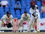 West Indies' Jason Holder plays a shot against England during day two of their first cricket Test match at the Sir Vivian Richards Cricket Ground in North Sound, Antigua and Barbuda. West Indies' Jason Holder plays a shot against England during day two of their first cricket Test match at the Sir Vivian Richards Cricket Ground in North Sound, Antigua and Barbuda.