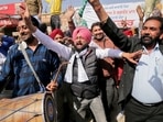 Supporters of the Aam Aadmi Party (AAP) celebrate after learning of the initial poll results in Amritsar(REUTERS)